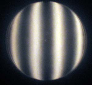 Turned down edge in a spherical mirror